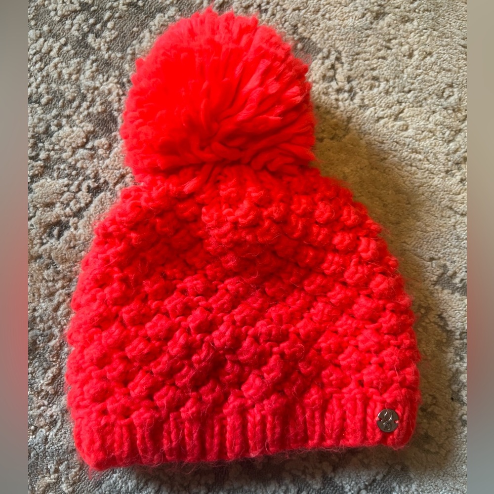 Bright pink spyder hat